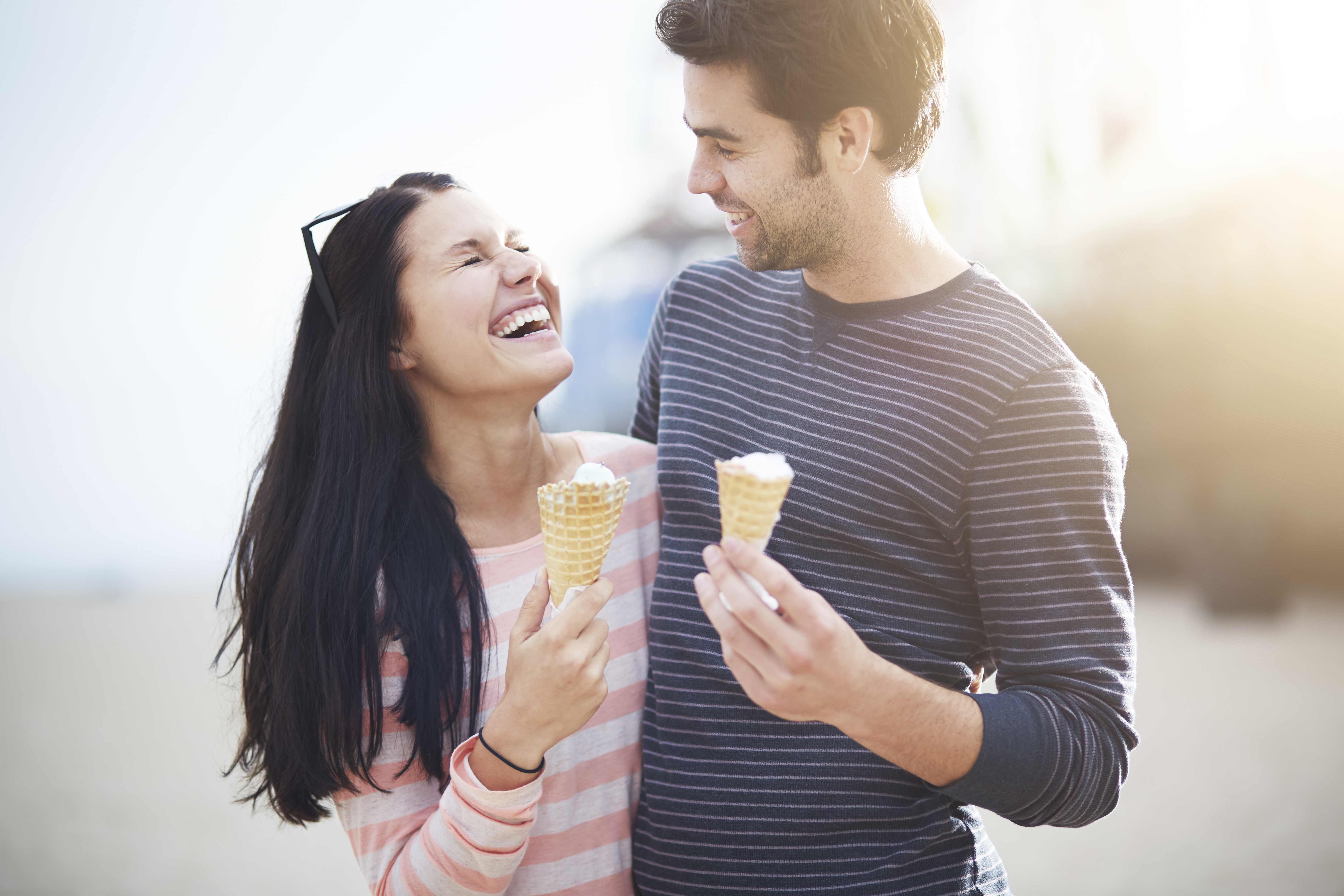 young couple eating ice cream